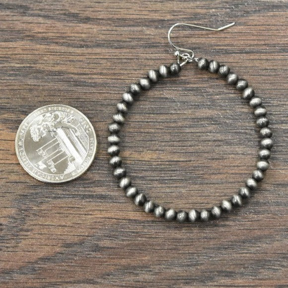 Delicate Cowgirl pearl hoop earrings