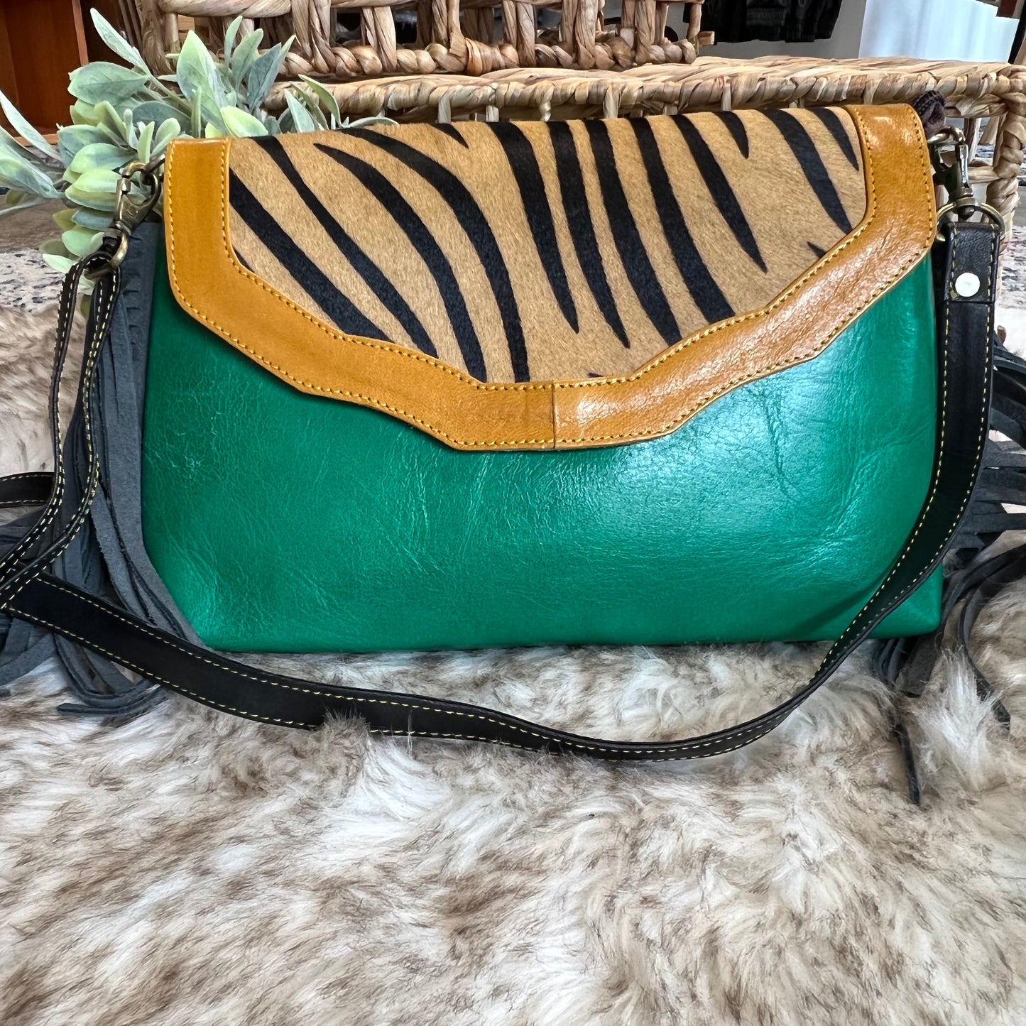 The Jules leather and hair on hide bag with fringe