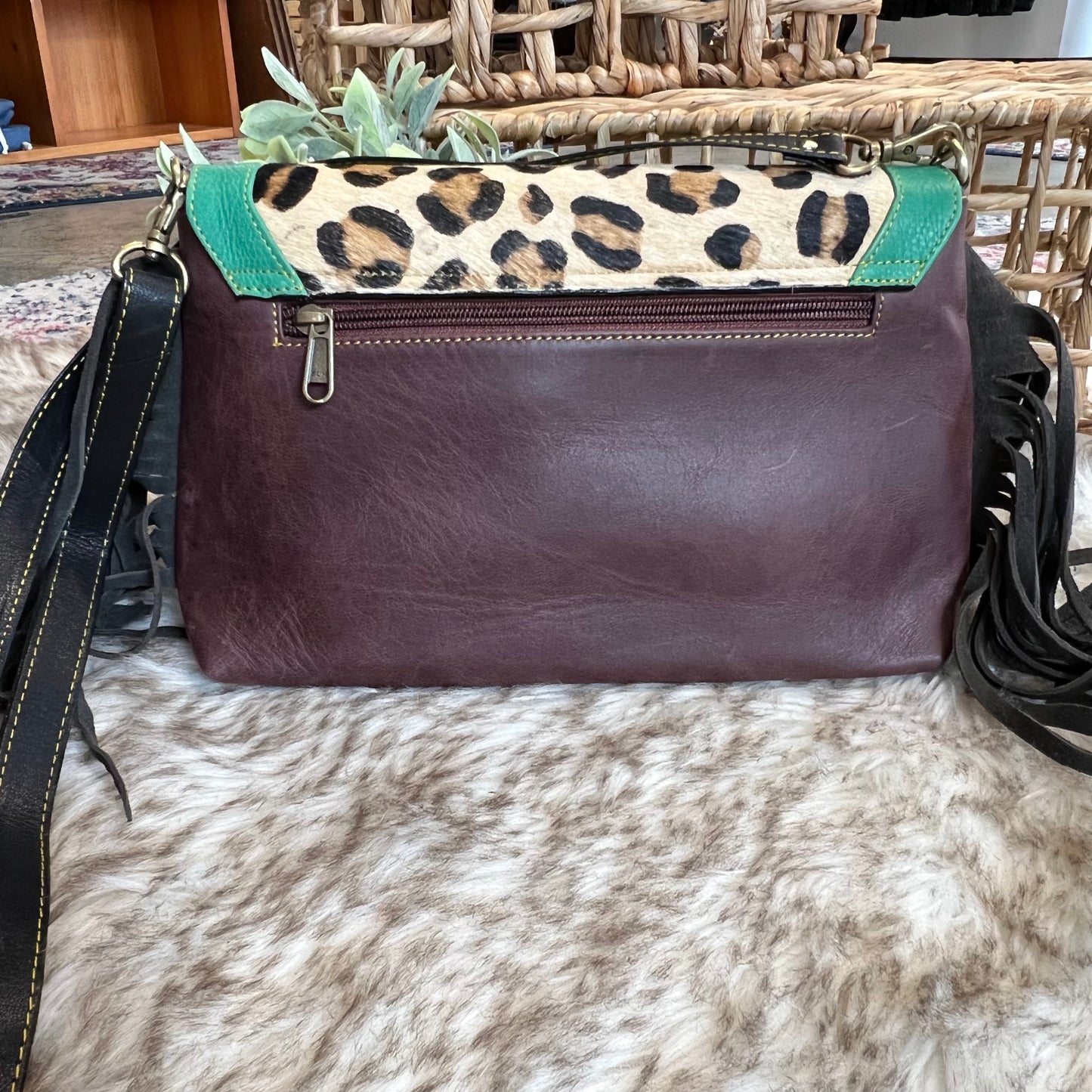 The Jules leather and hair on hide bag with fringe
