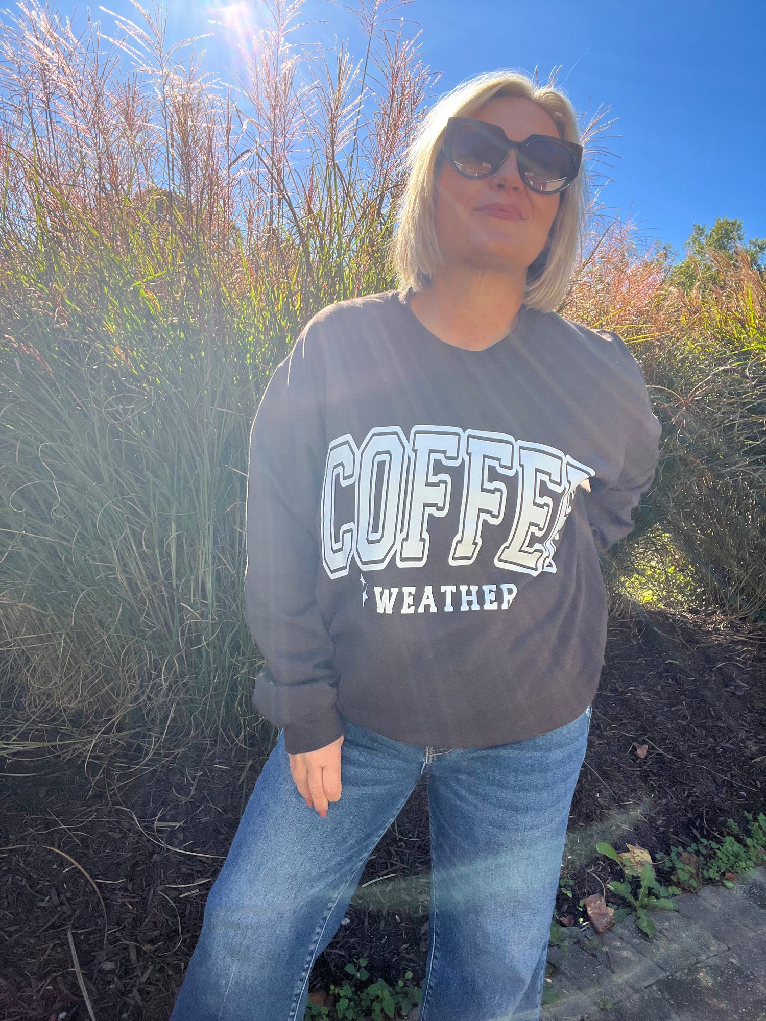 Ivory sweatshirt with muted image of a vintage truck filled with pumpkins. Image text: Meet me at the pumpkin patch