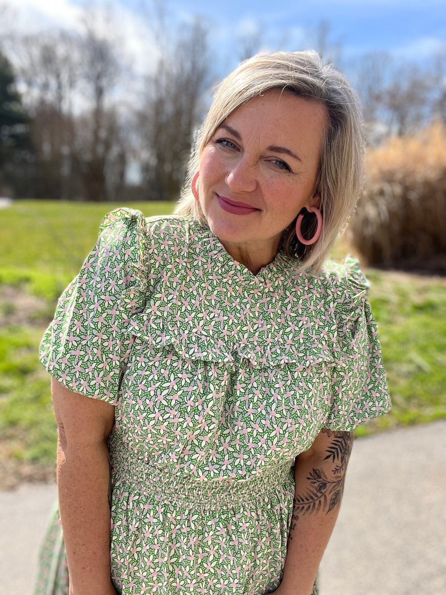 Green and pink floral print dress