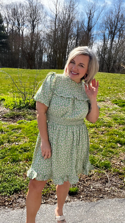 Green and pink floral print dress