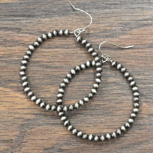 Delicate Cowgirl pearl hoop earrings