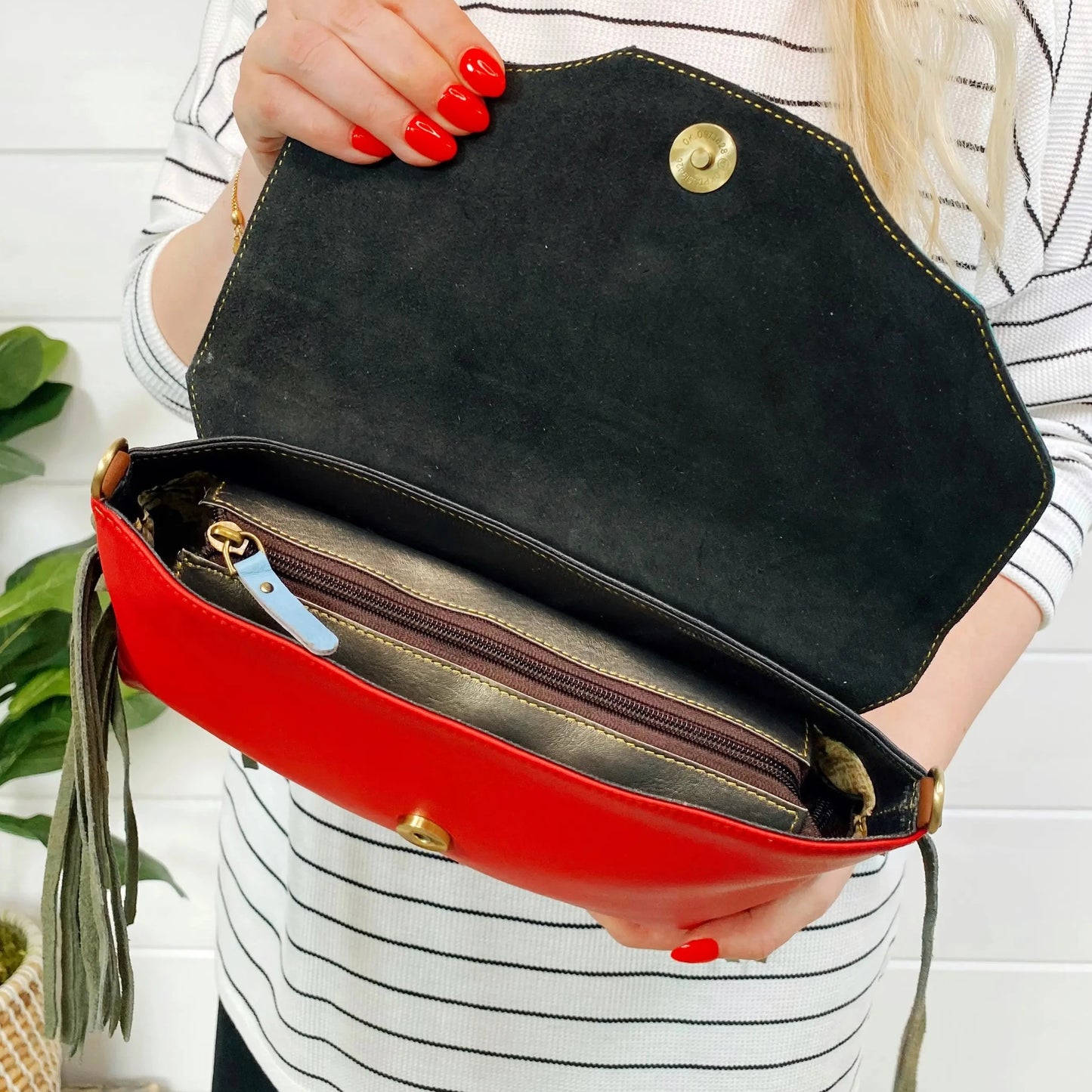 The Jules leather and hair on hide bag with fringe