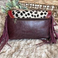The Jules leather and hair on hide bag with fringe