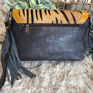 The Jules leather and hair on hide bag with fringe